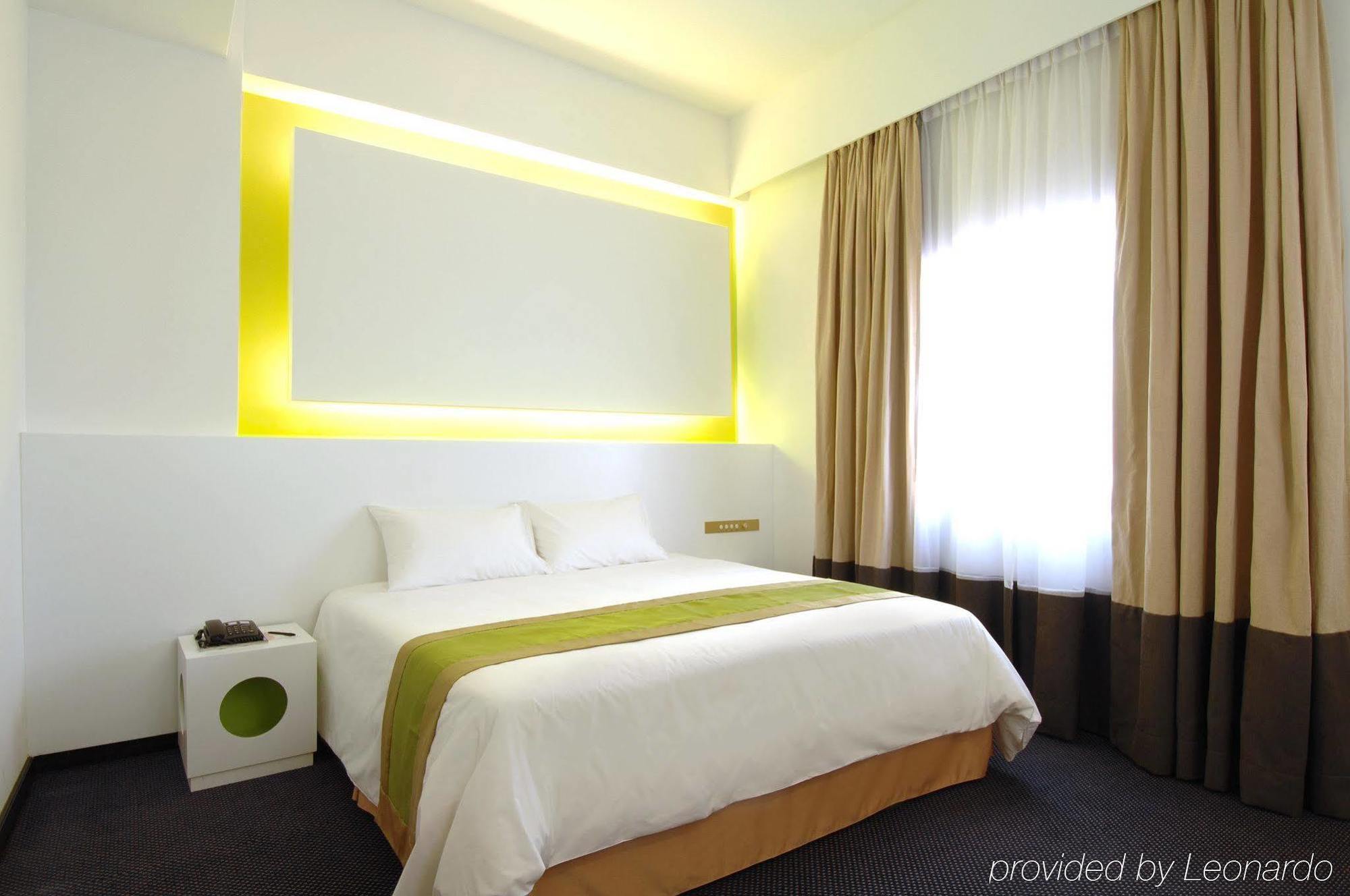 Q Hotel Куала Лумпур Стая снимка